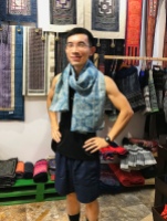 At my business partner's cotton and linen fabric and clothing shop in downtown Hanoi. I wanted a unique, one-of-a-kind scarf that speaks for my personality. This is it!